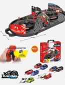 Автотрек, 2 светящиеся машины, пульт управления, сетевой адаптер, чемоданчик.